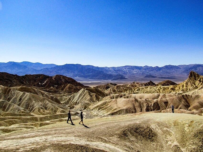 Walking across the badlands of Zabriskie Point, cool things to do in Death Valley.